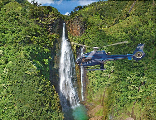 A Blue Hawaiian Eco-Star offers a stunning view of Kauai's spectacular Manawaiopuna Falls.