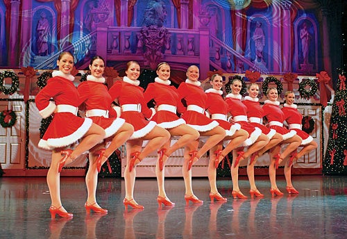 Dancers are in red and white costumes