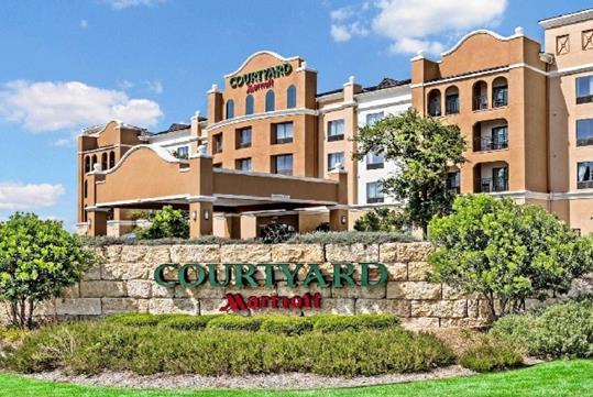 The front exterior of the Courtyard by Marriott San Antonio SeaWorld®/Westover Hills on a sunny day in San Antonio, Texas.