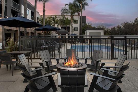 Cozy evenings by the poolside firepit.