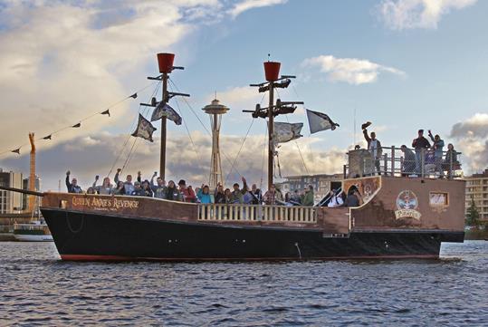 Wide shot of guests onboard the Queen Anne’s Revenge pirate ship on the Family Treasure Cruise.