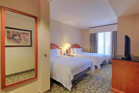 2 Queen beds, flat-screen TV at Hilton Garden Inn Las Vegas Strip South, NV.