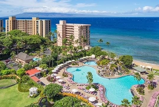 Aerial view of the Ka'anapali Beach Club and pool on a sunny day in Maui, Hawaii.