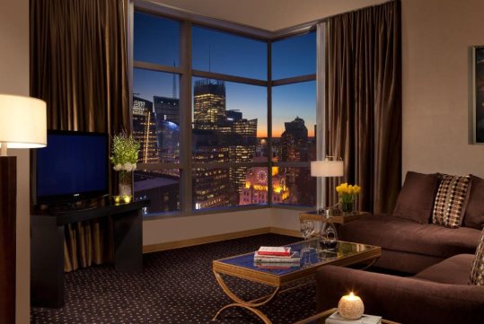 A luxurious seating area with stunning city views.