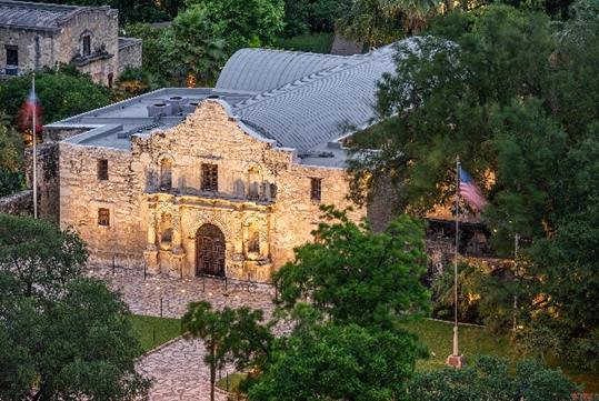 Aerial view looking down on the Alamo at dusk in San Antonio.