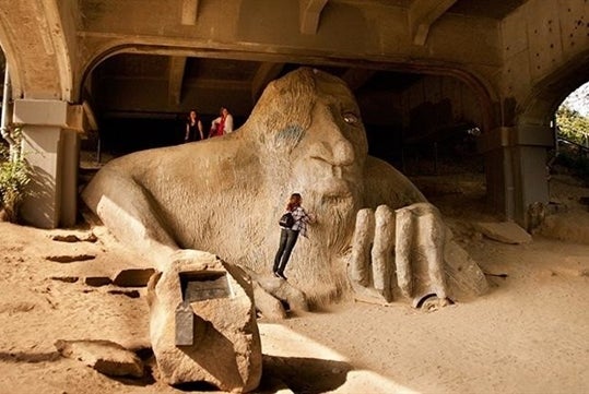 Guests are finding a perfect spot to pose with the famous Fremont Troll in Seattle. 