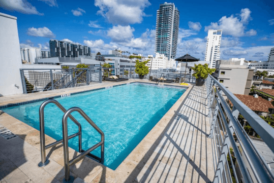 Outdoor pool at Riviera Suites, FL.