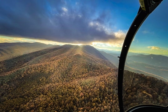 Stunning cabin views of the Appalachian Mountains on a scenic helicopter tour from Asheville, NC.