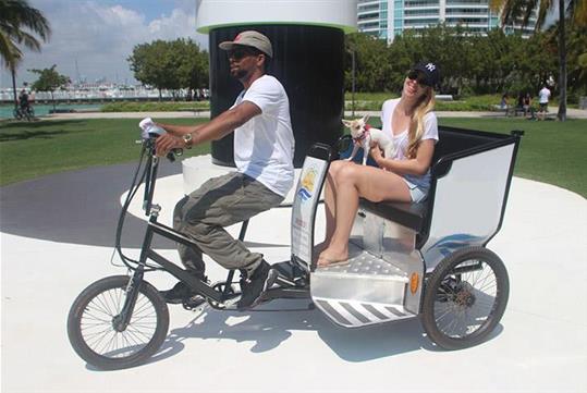 Ride with an experienced tour guide on an eco-friendly pedicab tour of Miami's South Beach.