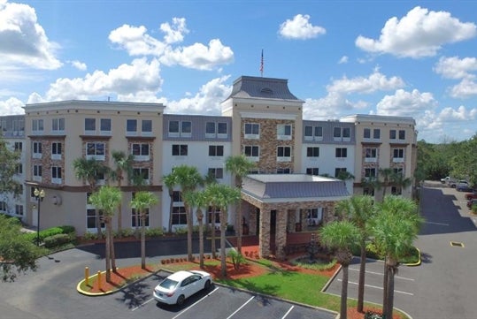 Aerial view of the front entrance at Staybridge Suites Orlando Royale Parc Suites.