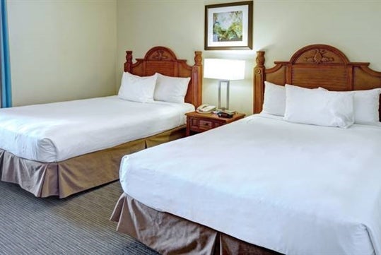 Guest room with two double beds.