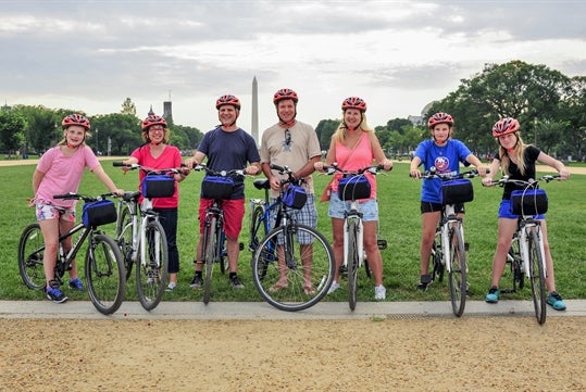 Group of families renting bike from Unlimited Biking in Washington DC