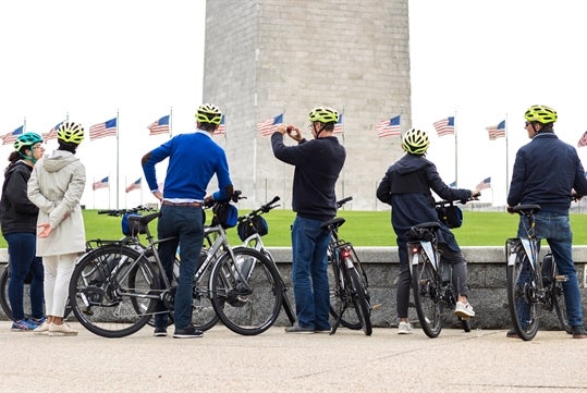 Unlimited Biking renters taking photos at the Monuments in Washington DC