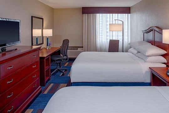 2 Queen beds with plush pillow top mattress at Wyndham New Orleans French Quarter.