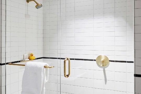 Walk-in shower inside a guest bathroom.