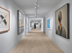 Inside corridors with contemporary, beautiful, original artwork in the hallways at 21c Museum Hotel Kansas City.