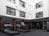 Fitness center with cardio equipment.