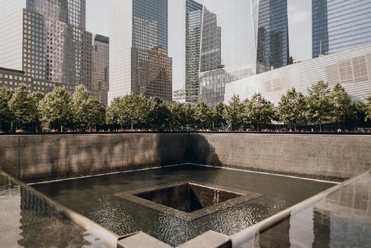 The Waterfall Pit at the 9/11 Memorial on the 9/11 Memorial Tour & Priority Entrance 9/11 Museum Tickets Tour in New York City, New York, USA.