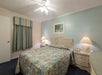 Guest room with a queen bed.