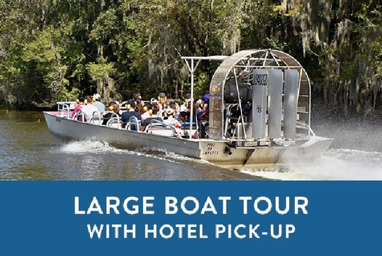 A large airboat carrying passengers travels on a river, surrounded by trees, with text promoting a large boat tour and hotel pick-up.