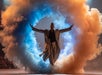 A person in a flowing outfit stands with arms raised inside a dramatic cloud of blue and orange smoke on a stage.