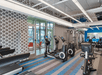 Fitness facility with cardio equipment.