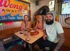 Three guests pose at Suzie Wongs