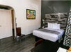 King Room with one king bed at Anaheim Discovery Inn.