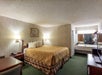 King bed inside a guest room.