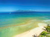 Private beach with clean blue waters and white sand.