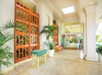 Outdoor lobby with seating area and directory.