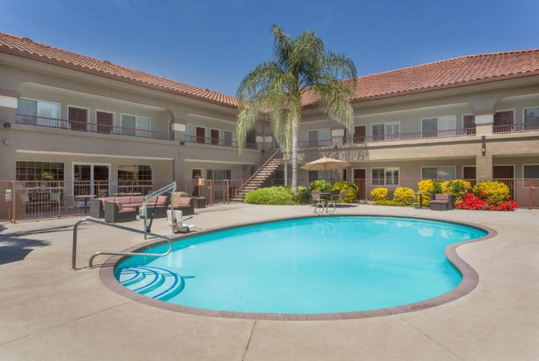 Outdoor pool and seating area.