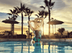 Refreshing outdoor pool at dusk.