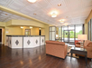 Lobby with lounge area and front desk.