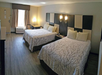 Guest room with two queen beds.