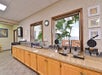 Breakfast buffet area with waffle makers.