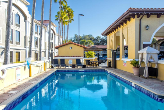 Dive into relaxation at the refreshing outdoor pool.