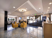 A warm welcome awaits in the lobby, designed for relaxation and connection.