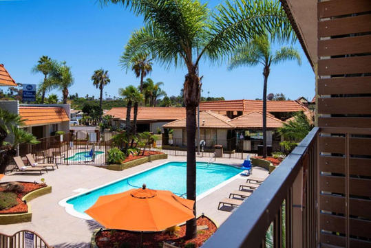Outdoor pool and sun loungers.