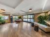 Lobby with seating area and ATM.