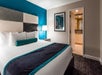One king bed with premium beddings.