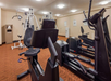 Fitness facility with gym equipment.