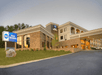 The hotel exterior and driveway, offering a welcoming entrance for your stay.