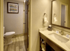 Enjoy the simplicity of a well-appointed bathroom featuring a sink and toilet.