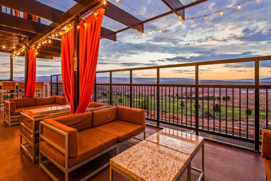 Enjoy the fresh air and breathtaking scenery from the comfortable outdoor seating area.