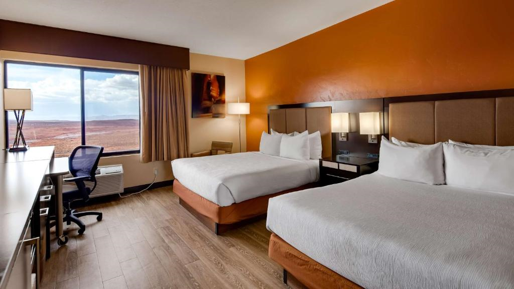 Enjoy a relaxing stay with two queen beds and a functional work desk.