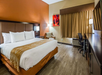Enjoy a comfortable stay with a plush king bed and a functional work desk.