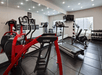 24-hour fitness room with treadmill, and other cardio equipment.