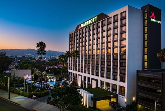 Exterior view of the hotel at night.