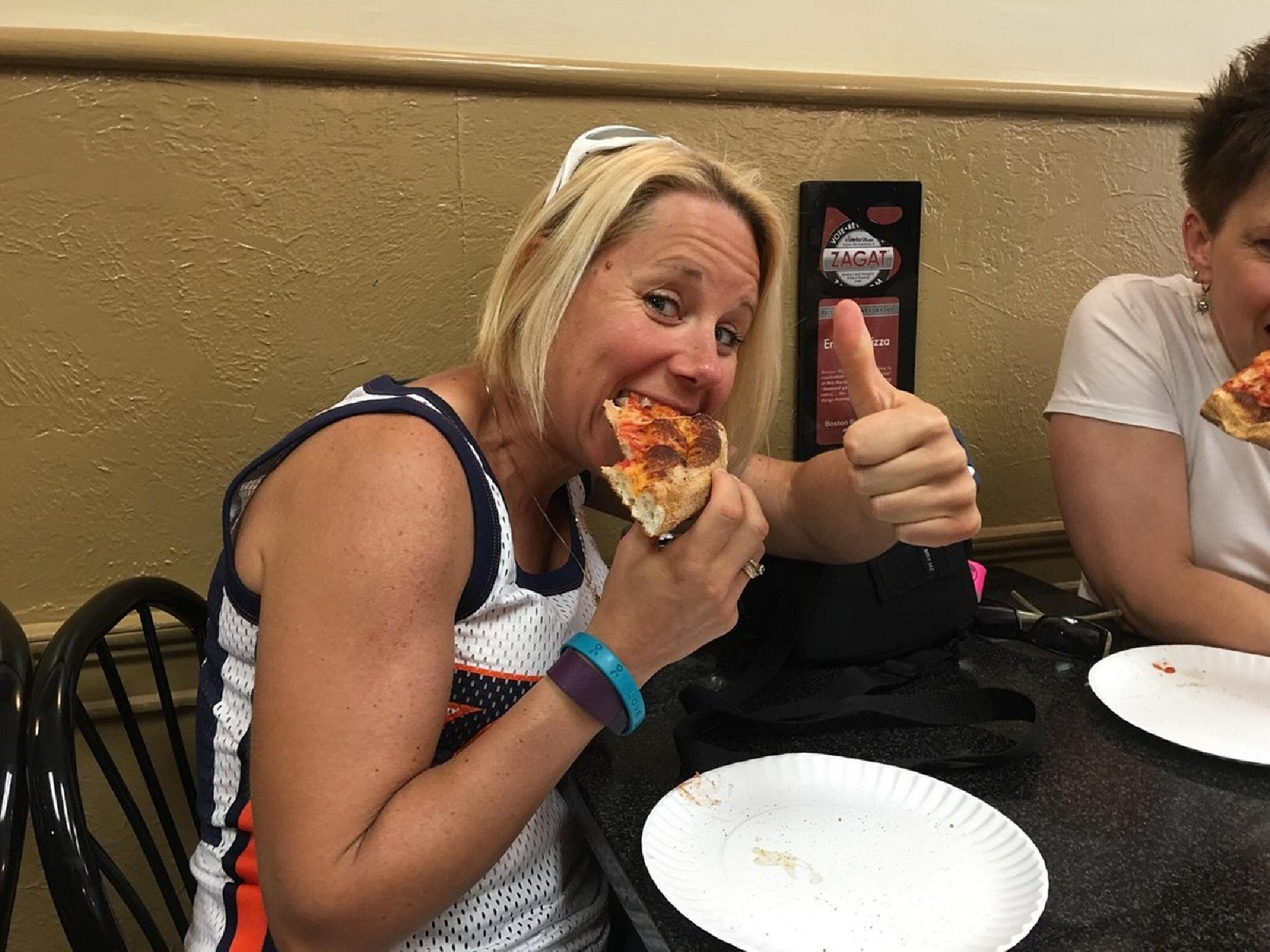 Enjoying a classic North End slice between tour stops.